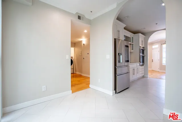 a view of a bathroom with a tub and shower