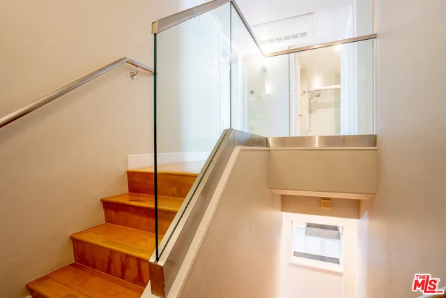 a view of a kitchen with washer and dryer