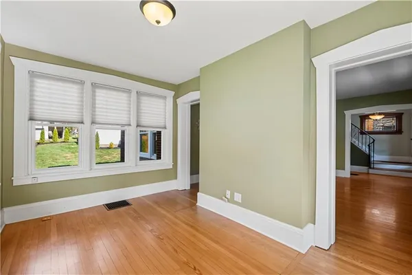 a view of livingroom with hardwood floor and window