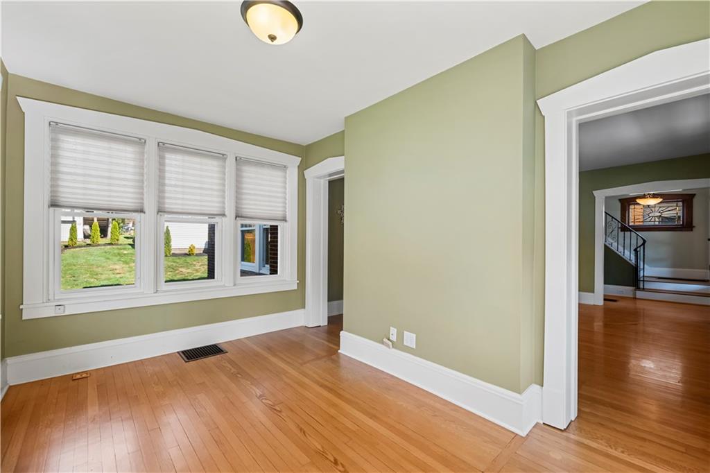 935 Alcoma Street Sharon, PA 16146 - Photo 12 of 28 a view of livingroom with hardwood floor and window