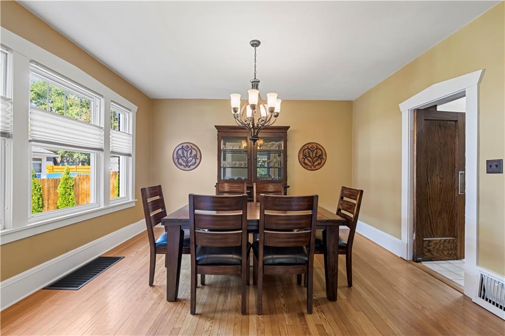 935 Alcoma Street Sharon, PA 16146 - Photo 13 of 28 a view of a dining room with furniture window and wooden floor