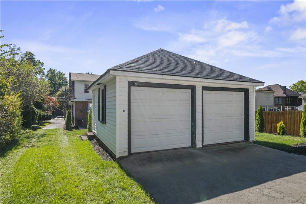 935 Alcoma Street Sharon, PA 16146 - Photo 6 of 28 a front view of a house with garden