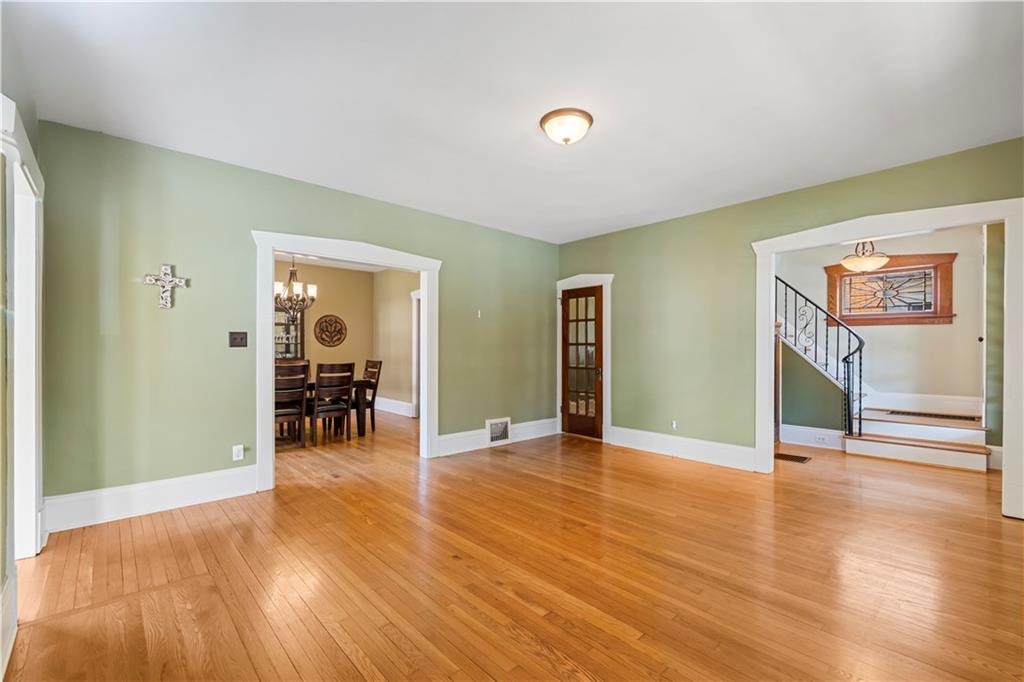 935 Alcoma Street Sharon, PA 16146 - Photo 8 of 28 a view of an empty room with wooden floor