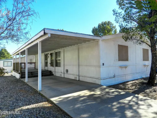 a view of a house with a garage