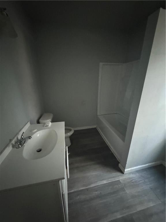 711 Highway 162 Covington, GA 30016 - Photo 17 of 25 a bathroom with a sink and vanity