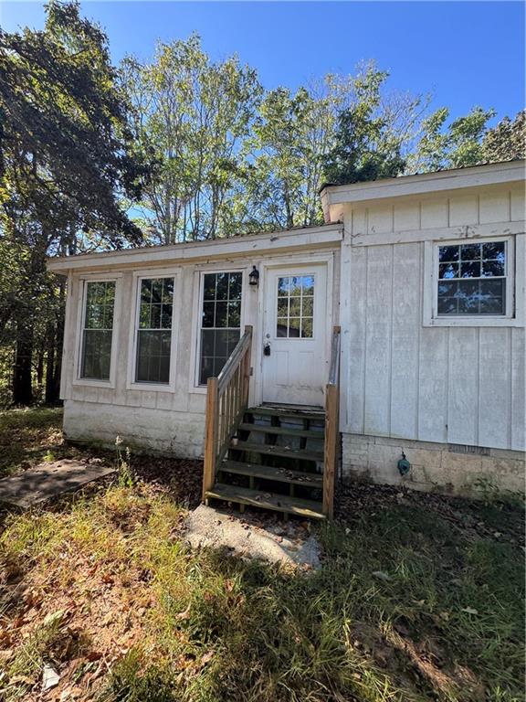 711 Highway 162 Covington, GA 30016 - Photo 3 of 25 a view of a house with a yard and furniture
