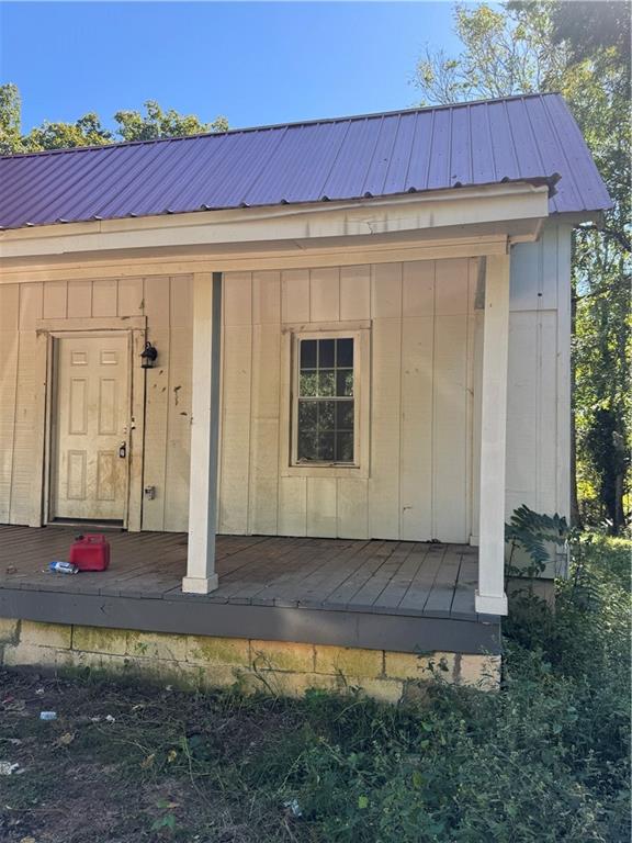 711 Highway 162 Covington, GA 30016 - Photo 7 of 25 a front view of a house with entryway