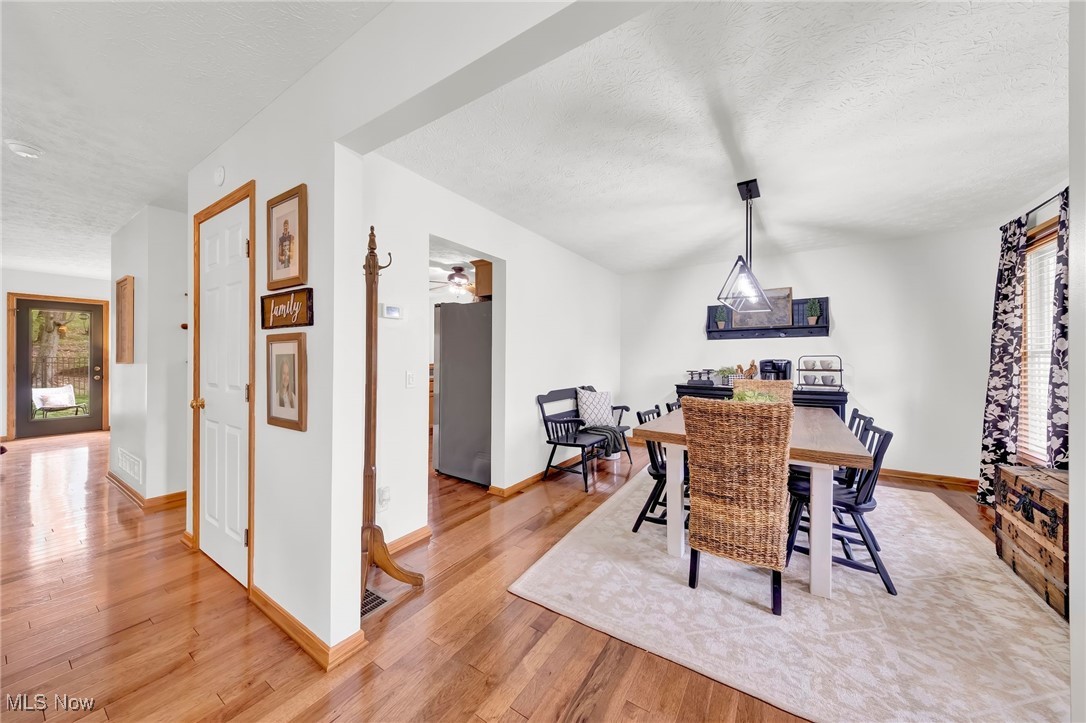 1247 Derbydale Road Akron, OH 44306 - Photo 9 of 45 view from entry of dining room with hardwood floors