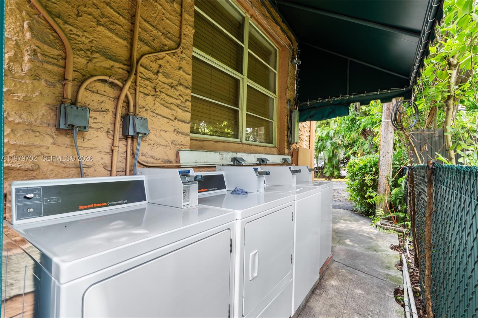 3409 South Le Jeune Road Coral Gables, FL 33134 - Photo 53 of 53 a utility room with dryer and washer