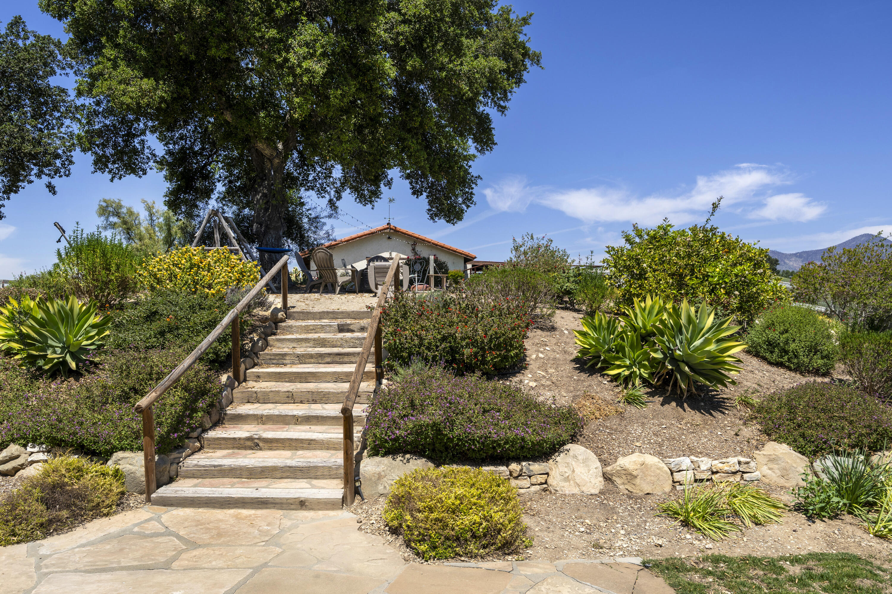3776 Live Oak Road Santa Ynez, CA 93460 - Photo 25 of 36 a view of a house with a yard