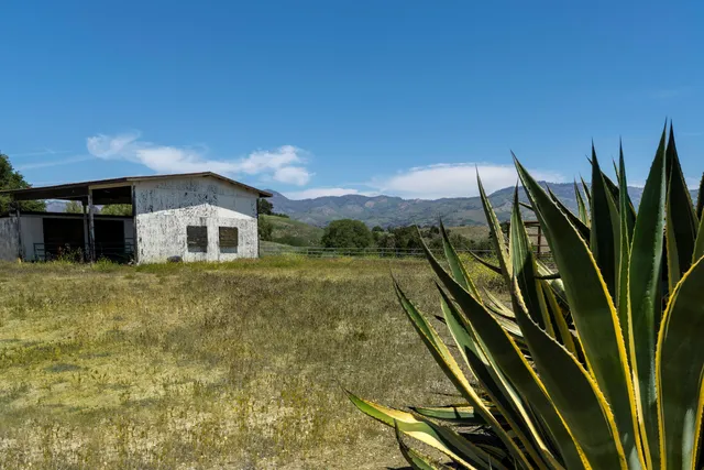 an aerial view of a city with lots of residential buildings