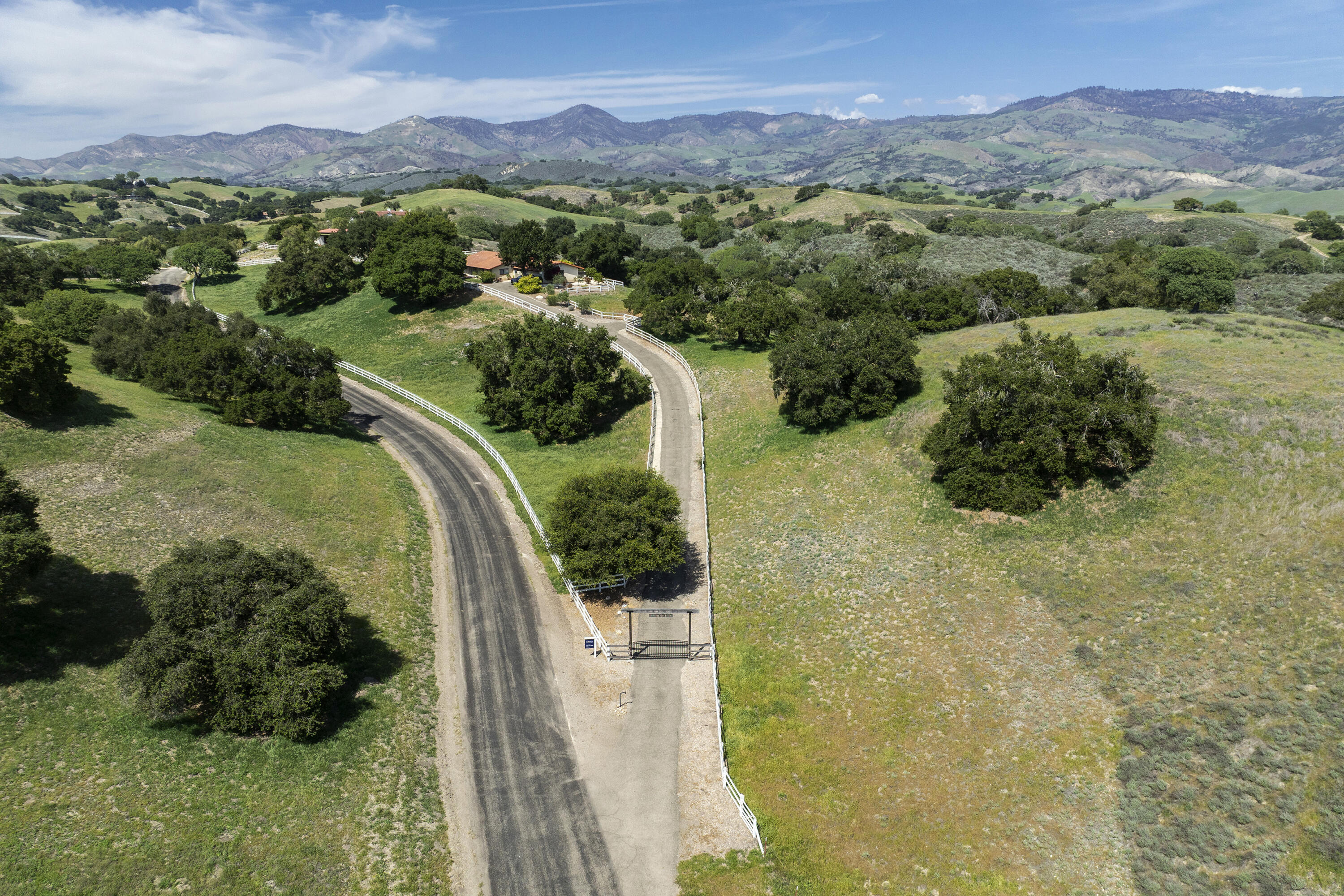 3776 Live Oak Road Santa Ynez, CA 93460 - Photo 3 of 36 a view of a lush green hillside and a mountain view