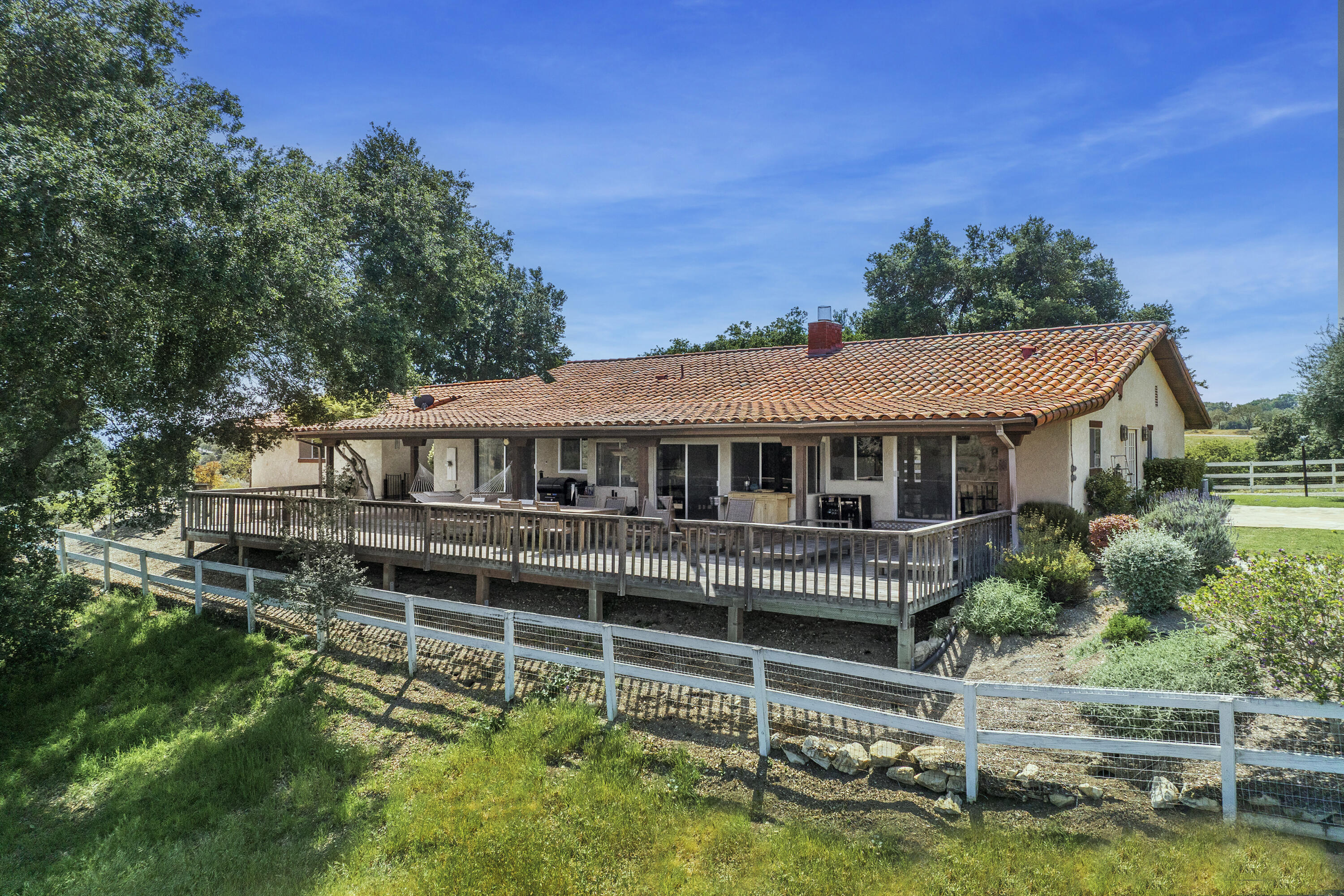 3776 Live Oak Road Santa Ynez, CA 93460 - Photo 5 of 36 a front view of a house with a yard balcony