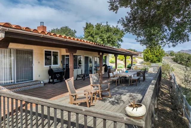 a view of livingroom with furniture and workspace