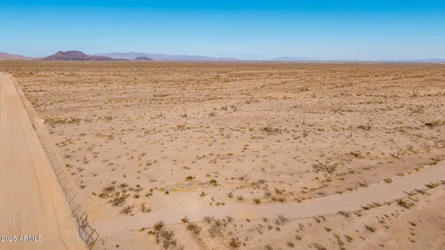 a view of ocean and mountain