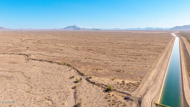 a view of mountain with lake view