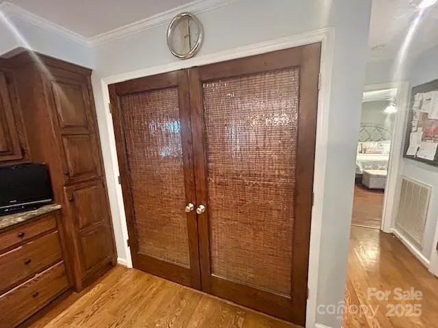 a bathroom with a shower and a sink