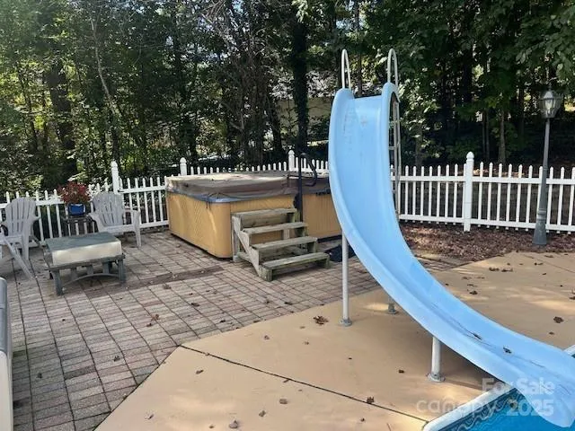 a view of a wooden deck with a bench