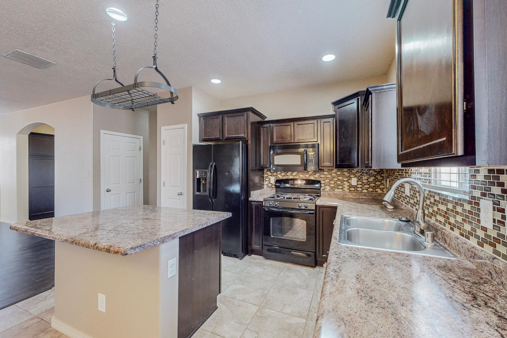 8323 Mock Heather Road Northwest Albuquerque, NM 87120 - Photo 8 of 39 Gallery Image 8