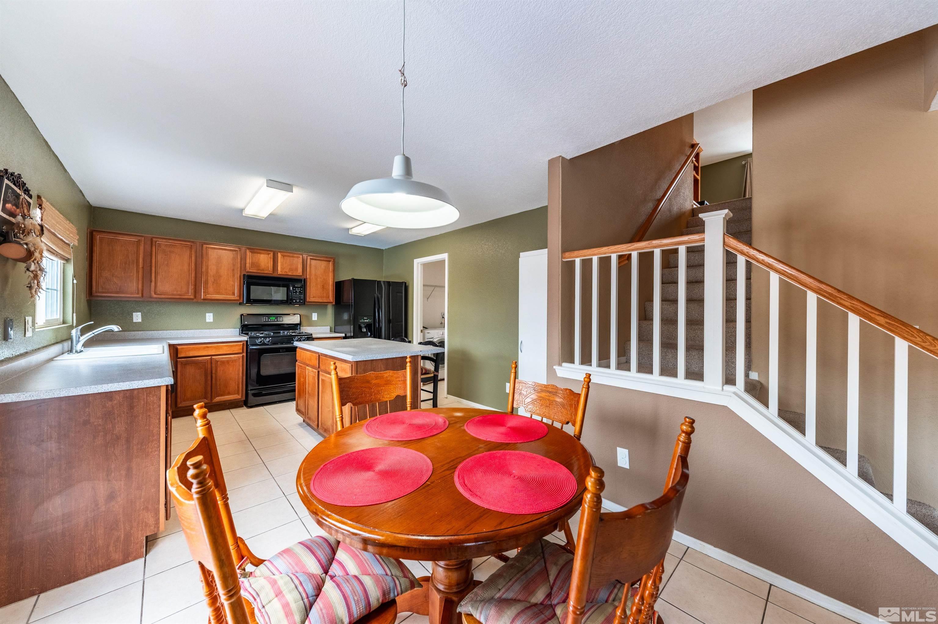 7830 Welsh Drive Reno, NV 89506 - Photo 12 of 27 a view of a dining room with furniture