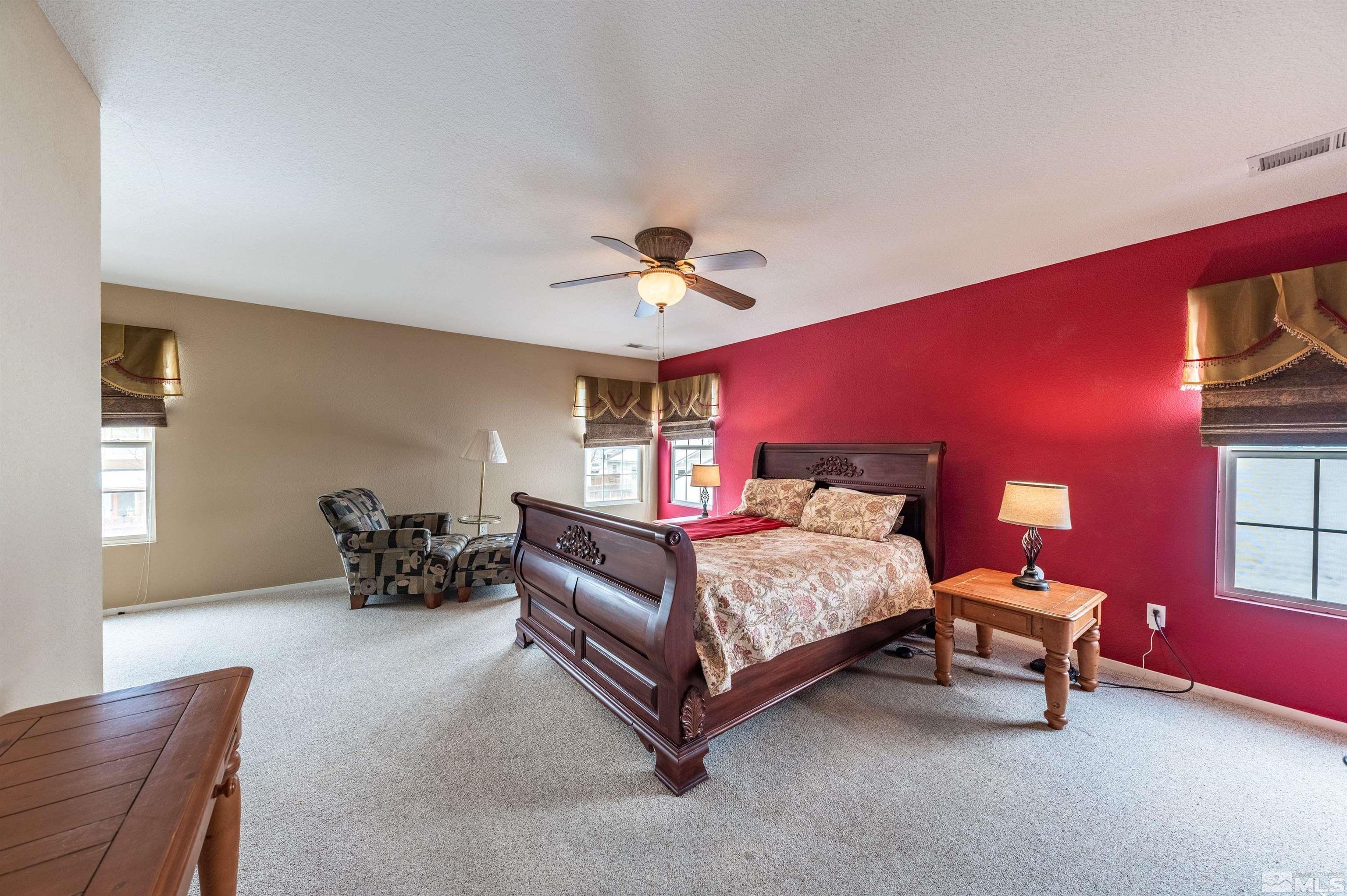 7830 Welsh Drive Reno, NV 89506 - Photo 20 of 27 a bed room with a bed and a window