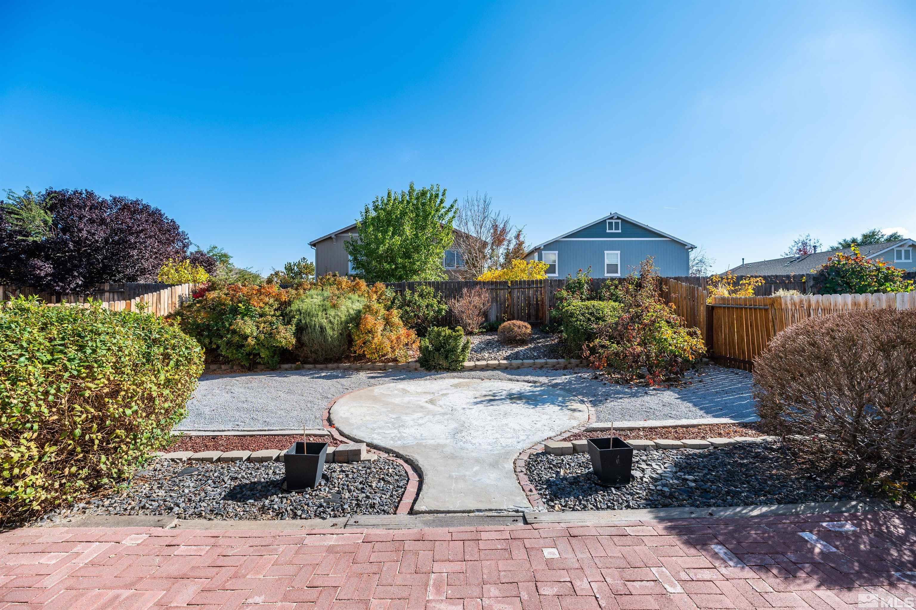 7830 Welsh Drive Reno, NV 89506 - Photo 26 of 27 a view of a backyard with plants and outdoor seating