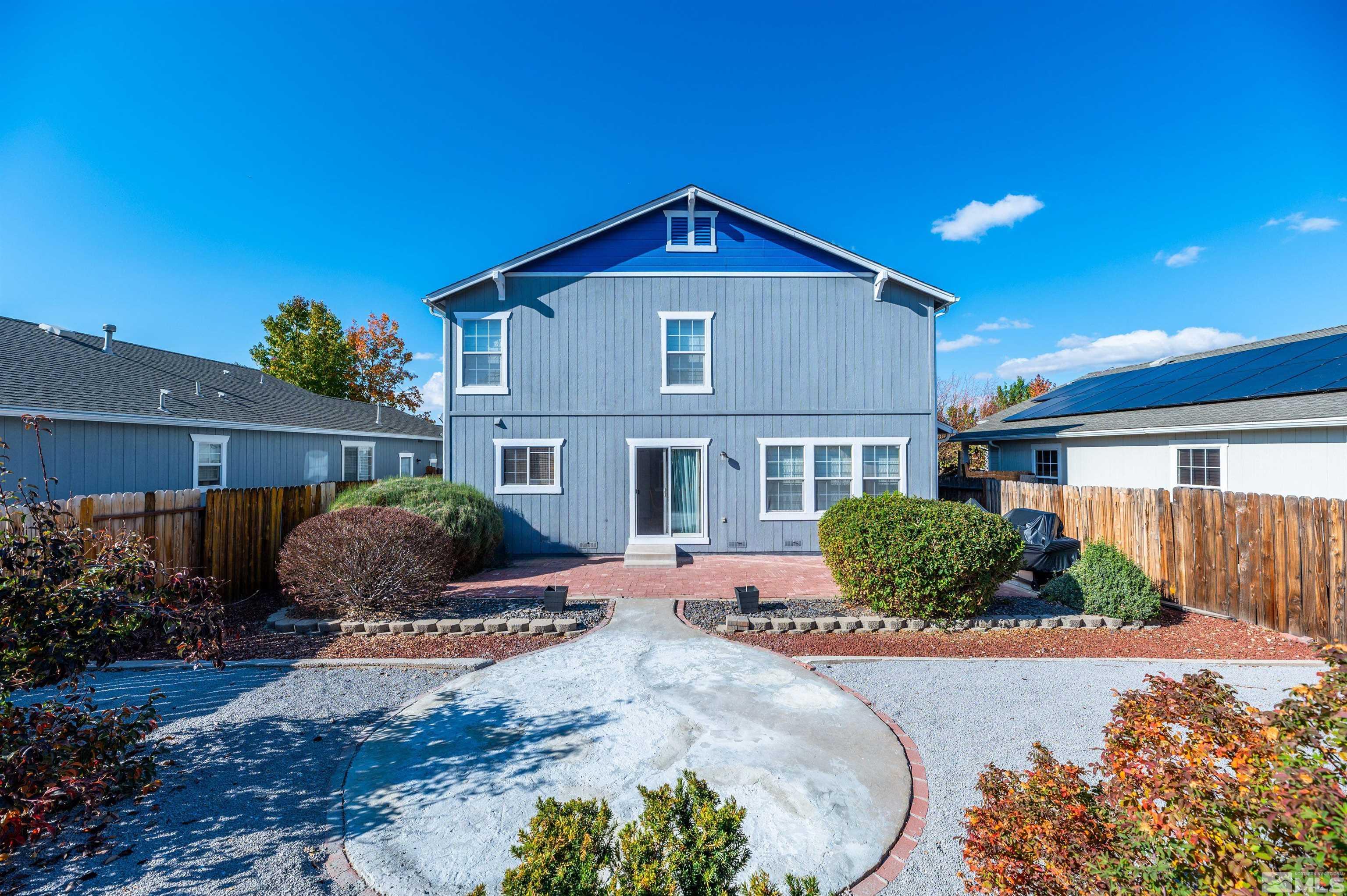 7830 Welsh Drive Reno, NV 89506 - Photo 27 of 27 a front view of a house with a yard