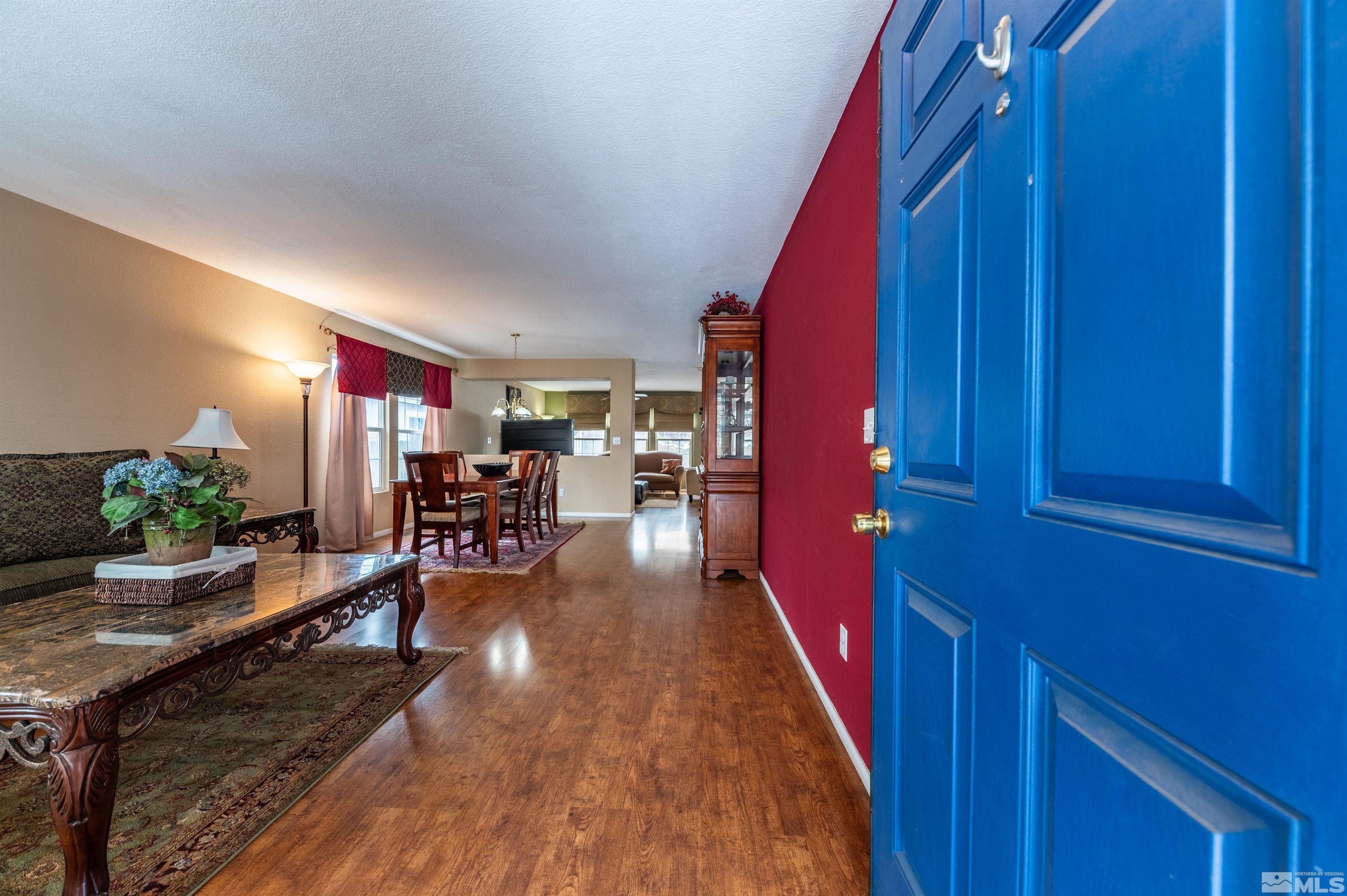 7830 Welsh Drive Reno, NV 89506 - Photo 3 of 27 a living room with furniture and a wooden floors