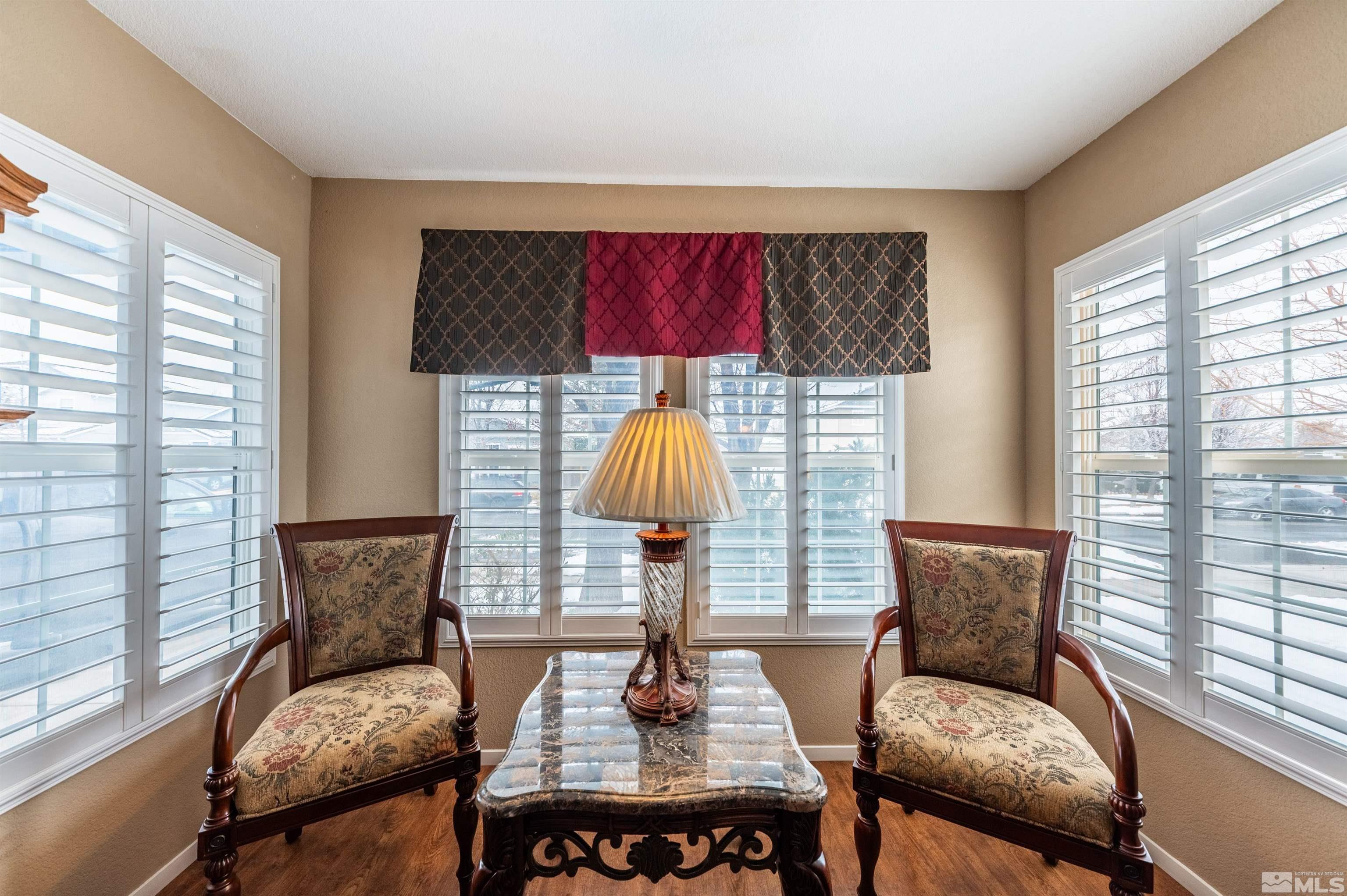 7830 Welsh Drive Reno, NV 89506 - Photo 5 of 27 a living room with furniture and a large window