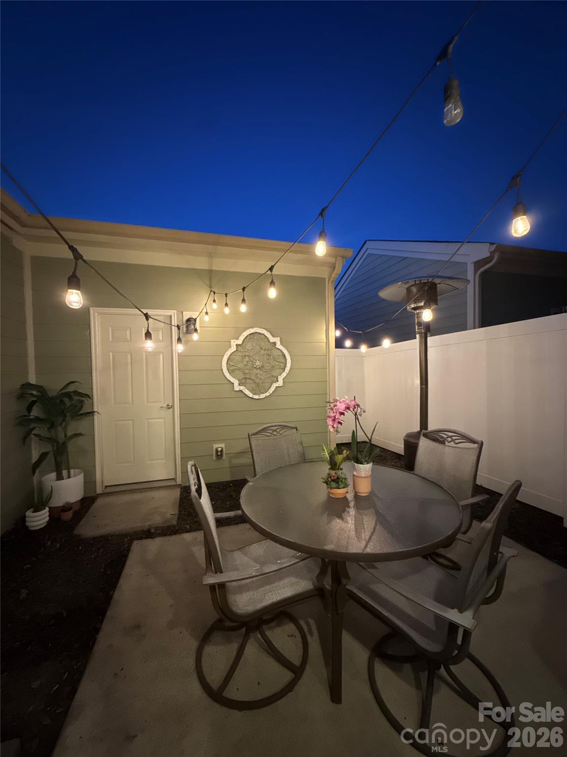 1225 Assembly Street Belmont, NC 28012 - Photo 17 of 17 a dining room with furniture and a potted plant