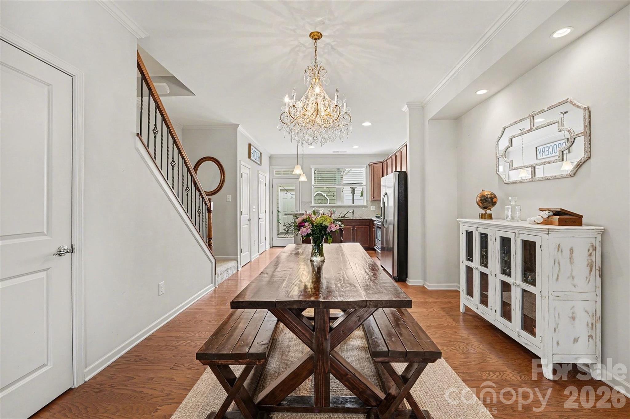 1225 Assembly Street Belmont, NC 28012 - Photo 2 of 17 a view of a dining room with furniture and wooden floor