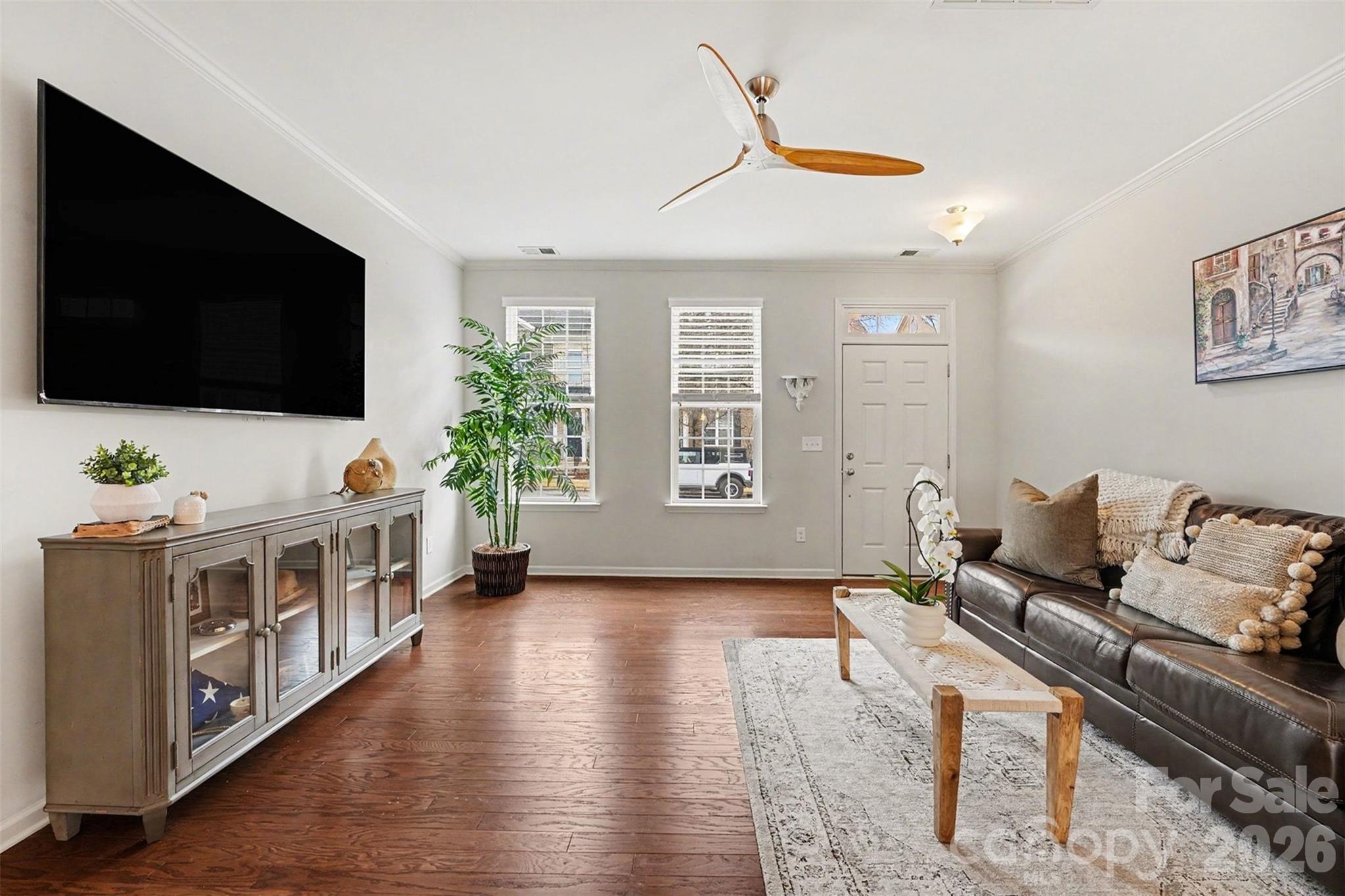 1225 Assembly Street Belmont, NC 28012 - Photo 3 of 17 a living room with furniture and a flat screen tv