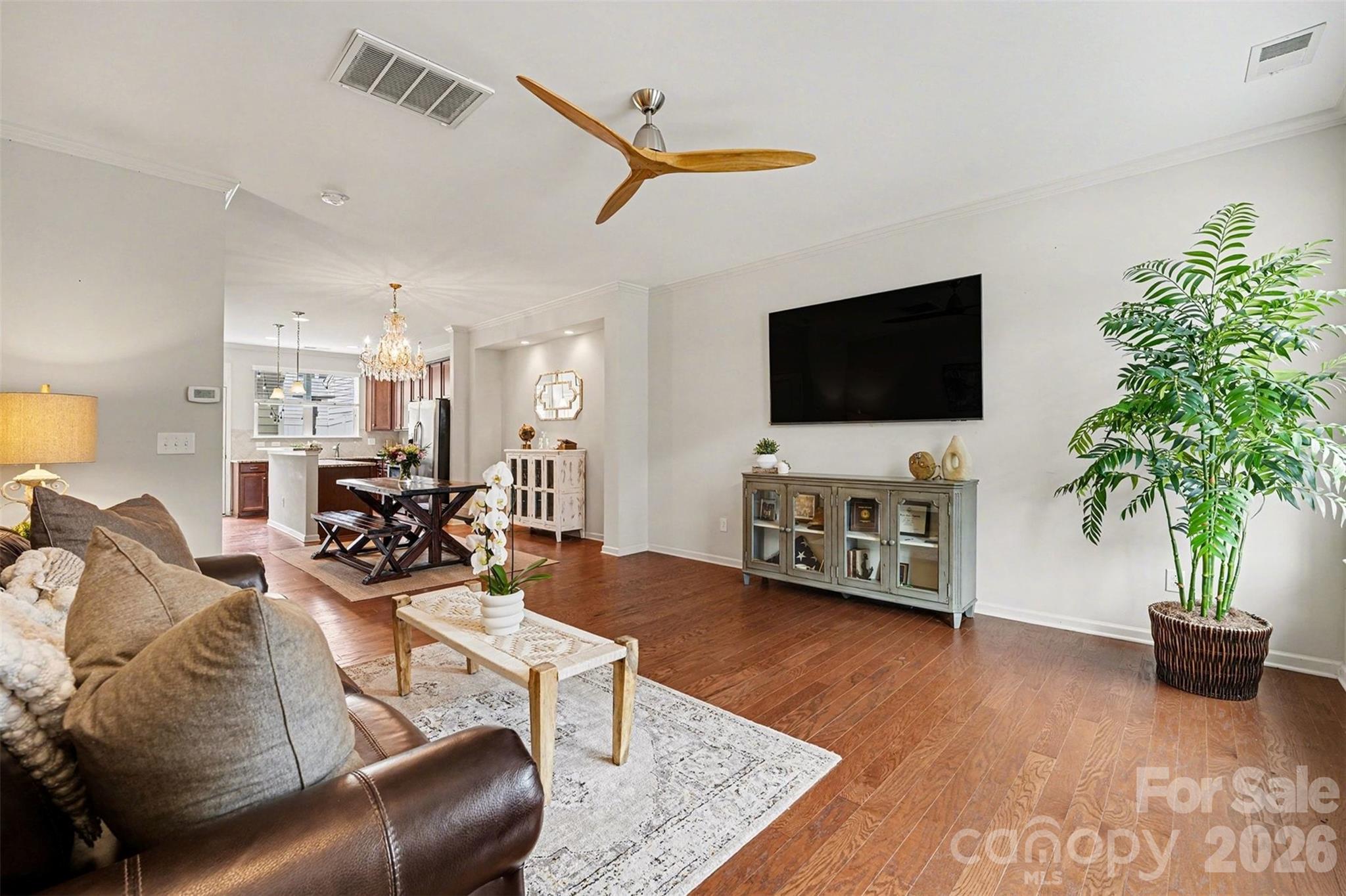 1225 Assembly Street Belmont, NC 28012 - Photo 5 of 17 a living room with furniture and a flat screen tv