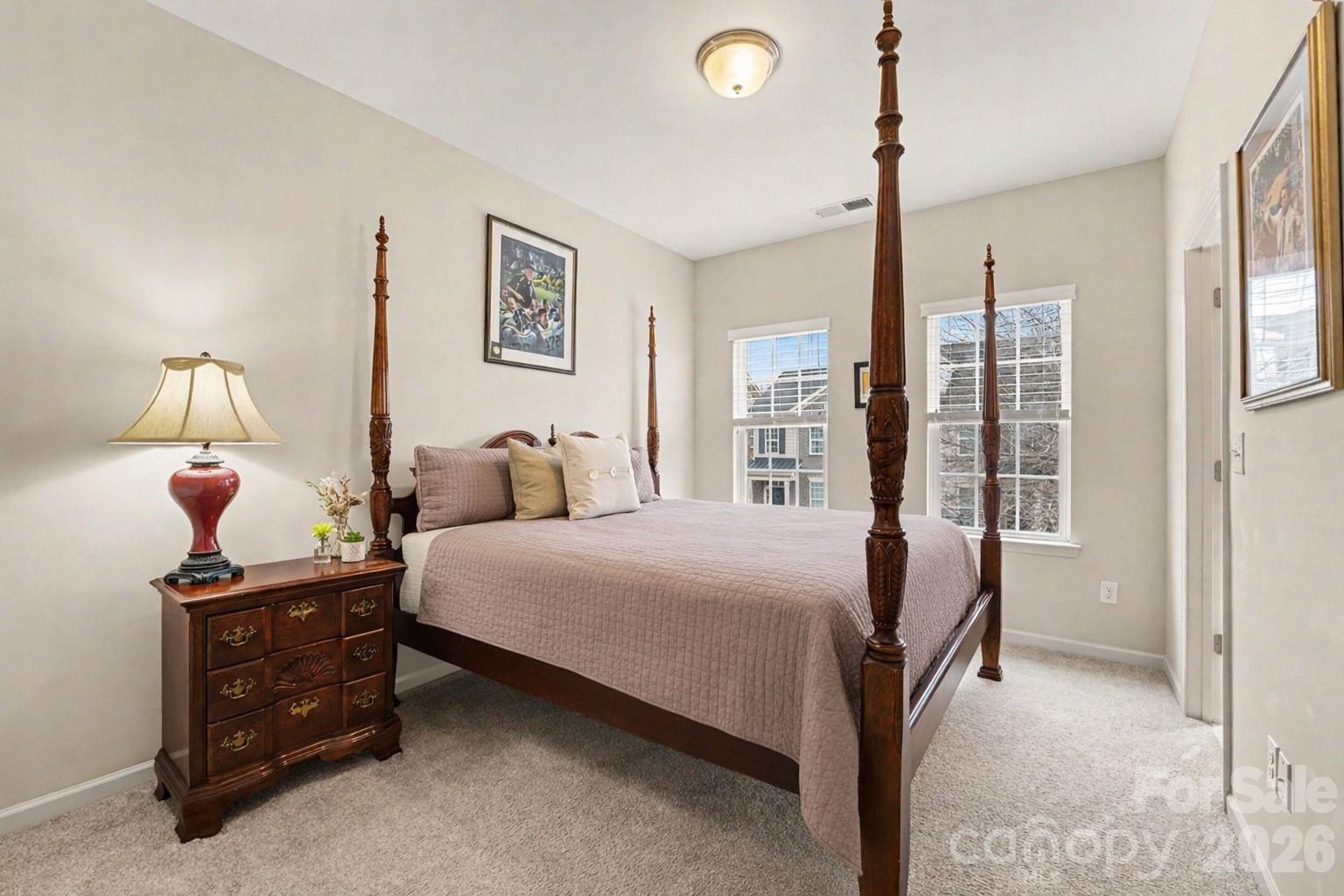 1225 Assembly Street Belmont, NC 28012 - Photo 10 of 17 a bedroom with a bed and a window