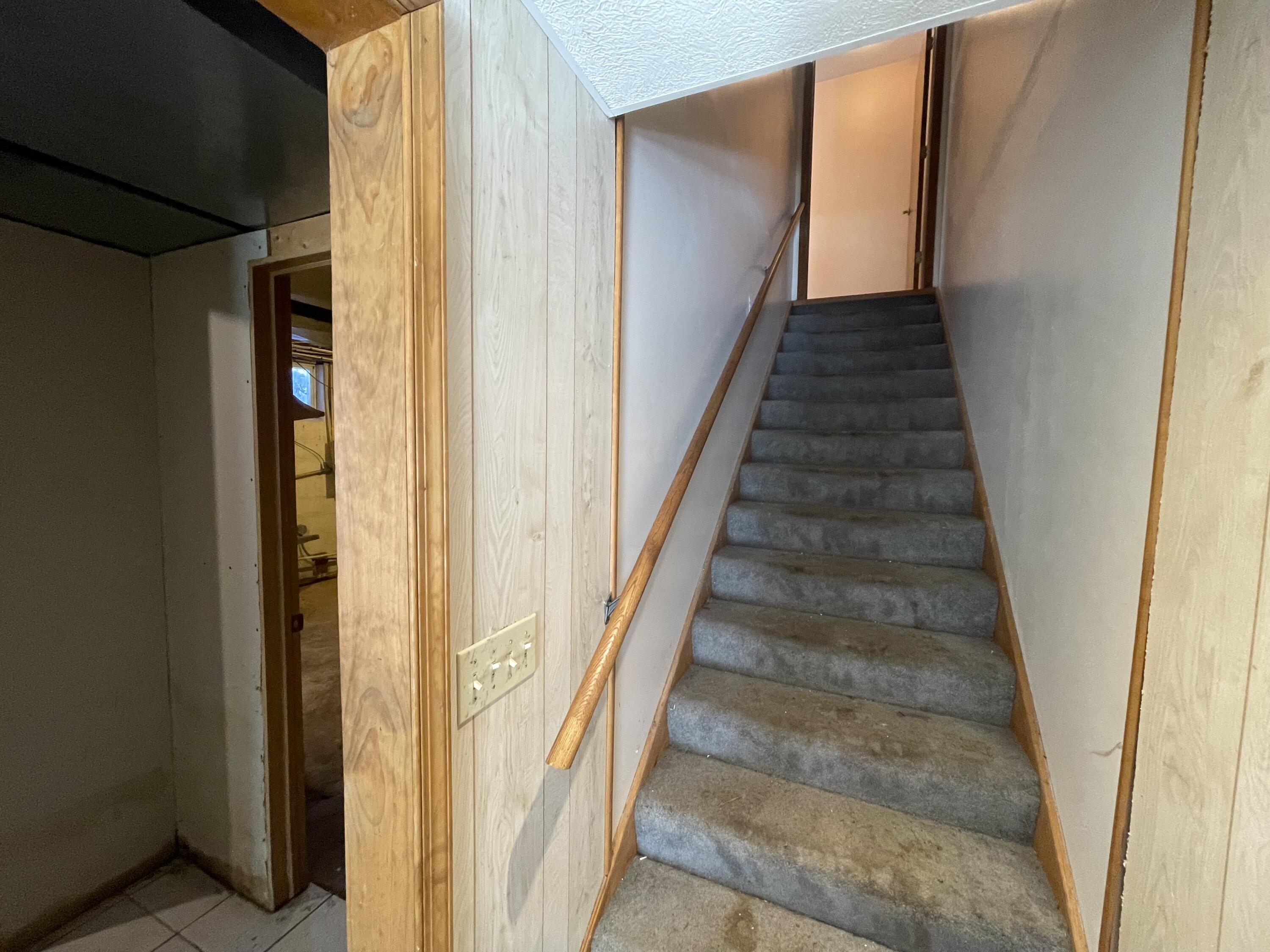 9710 Rustic Drive Demotte, IN 46310 - Photo 20 of 31 a view of a hallway with wooden floor and entryway