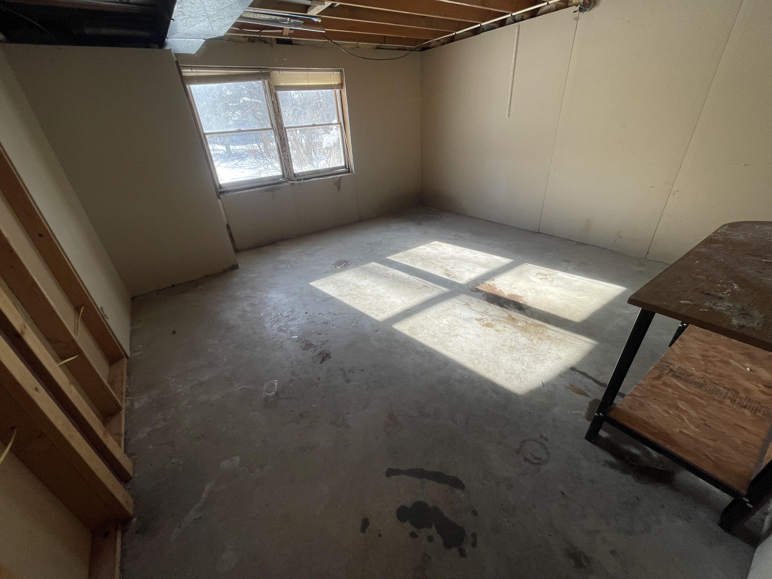 9710 Rustic Drive Demotte, IN 46310 - Photo 24 of 31 a view of an empty room and window