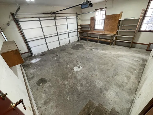 a view of a house with a tree