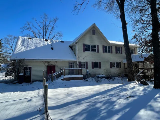 a view of a balcony with wooden floor