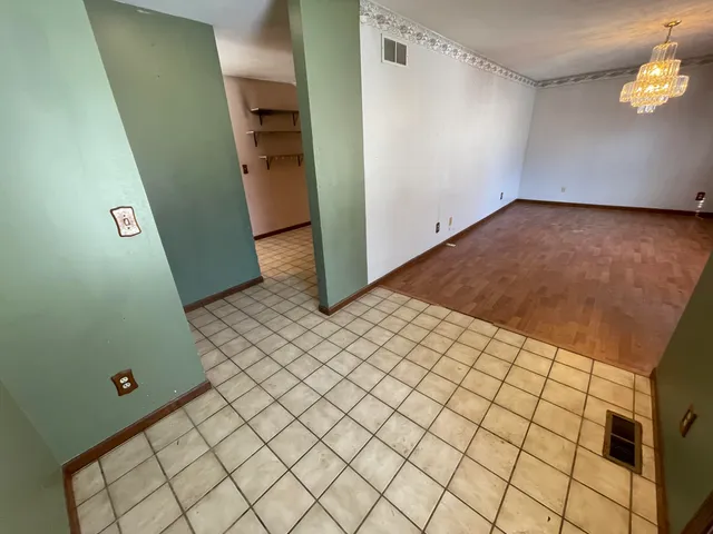 en empty room with windows