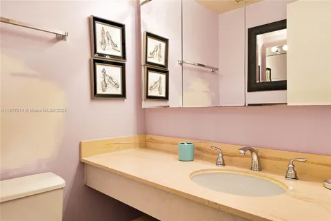 a bathroom with a sink and a toilet