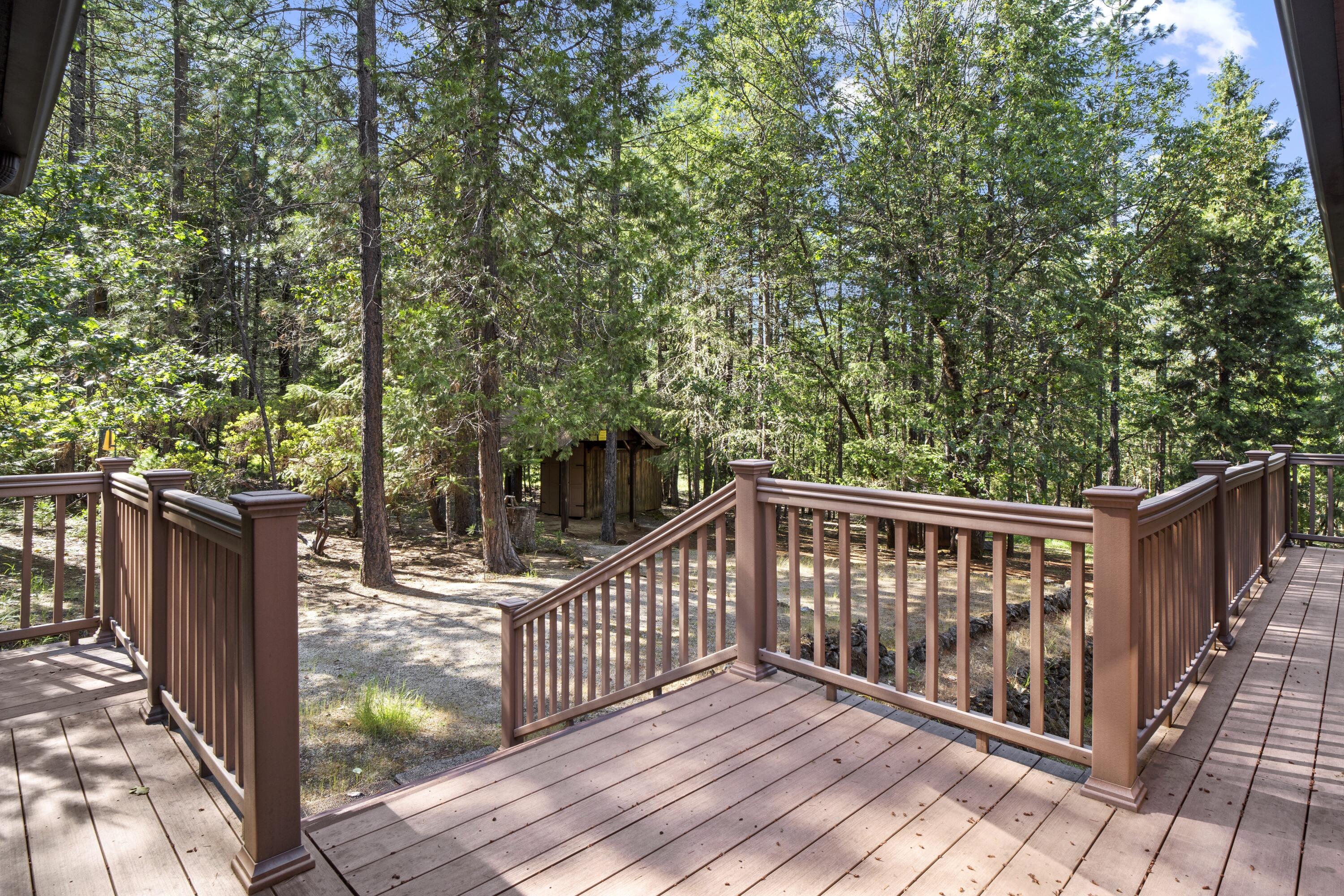2021 Queens Branch Road Rogue River, OR 97537 - Photo 20 of 37 a view of deck with wooden floor and fence