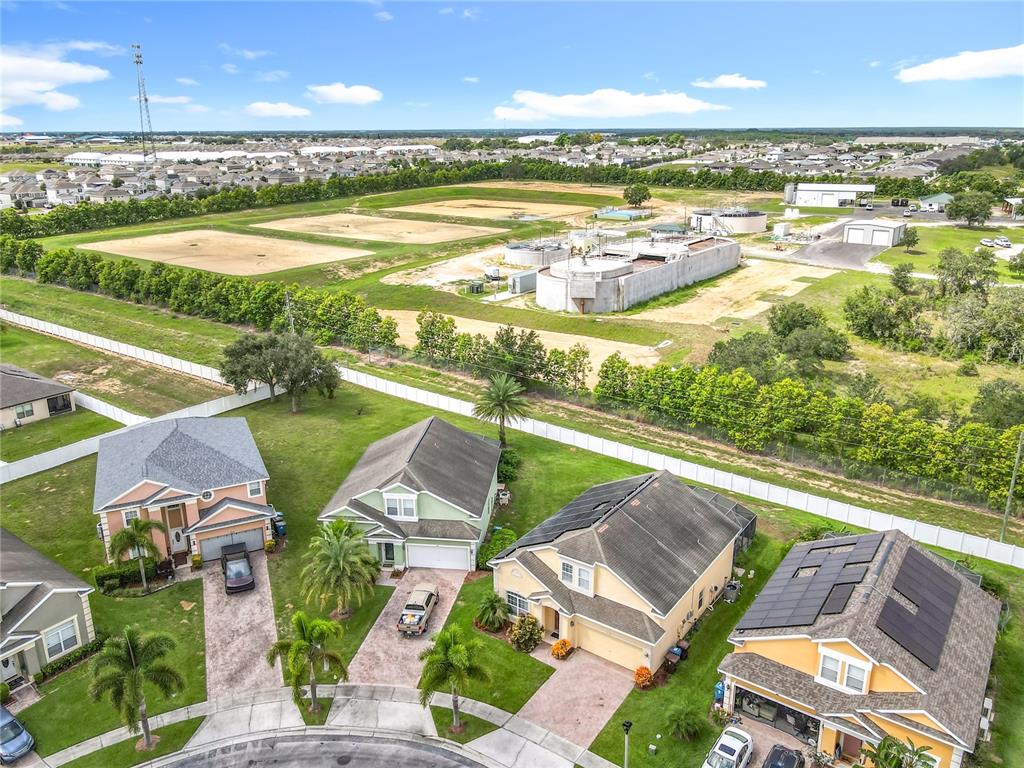 334 Cadiz Loop Davenport, FL 33837 - Photo 4 of 63 an aerial view of residential houses with outdoor space and ocean view