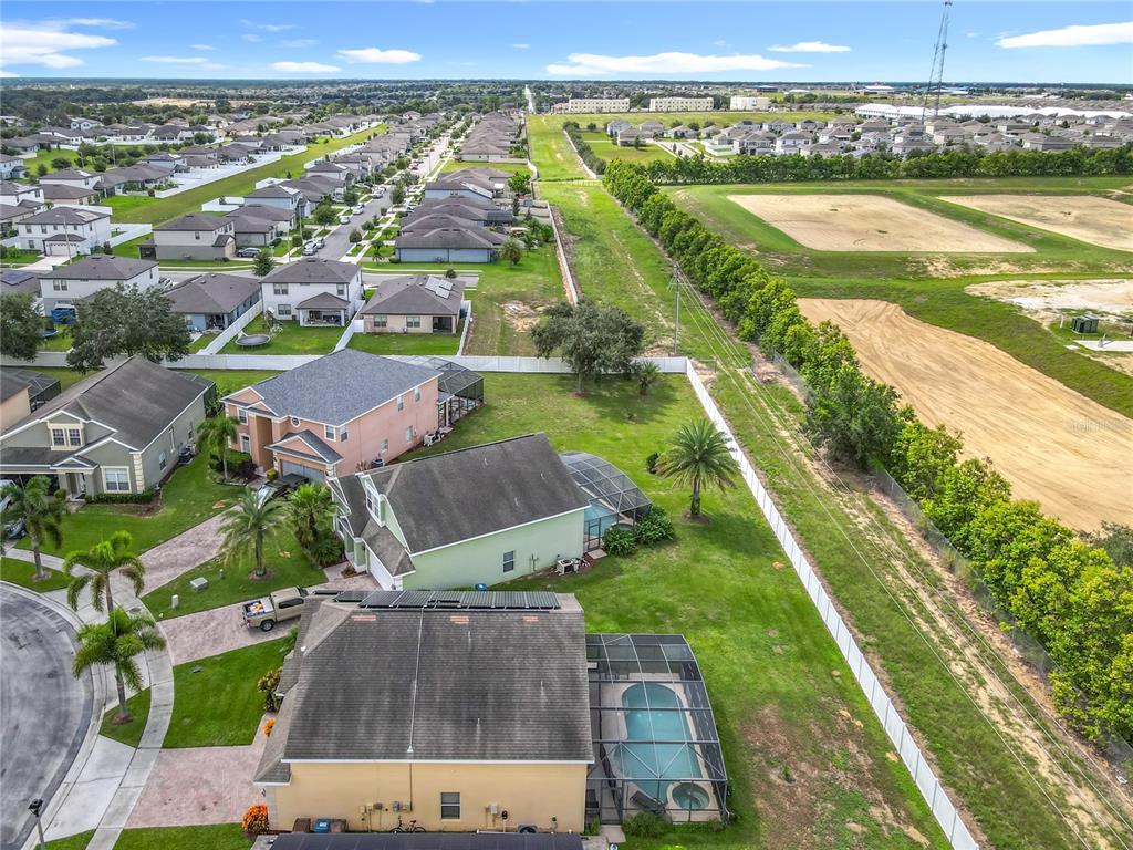 334 Cadiz Loop Davenport, FL 33837 - Photo 63 of 63 an aerial view of residential houses with outdoor space and river