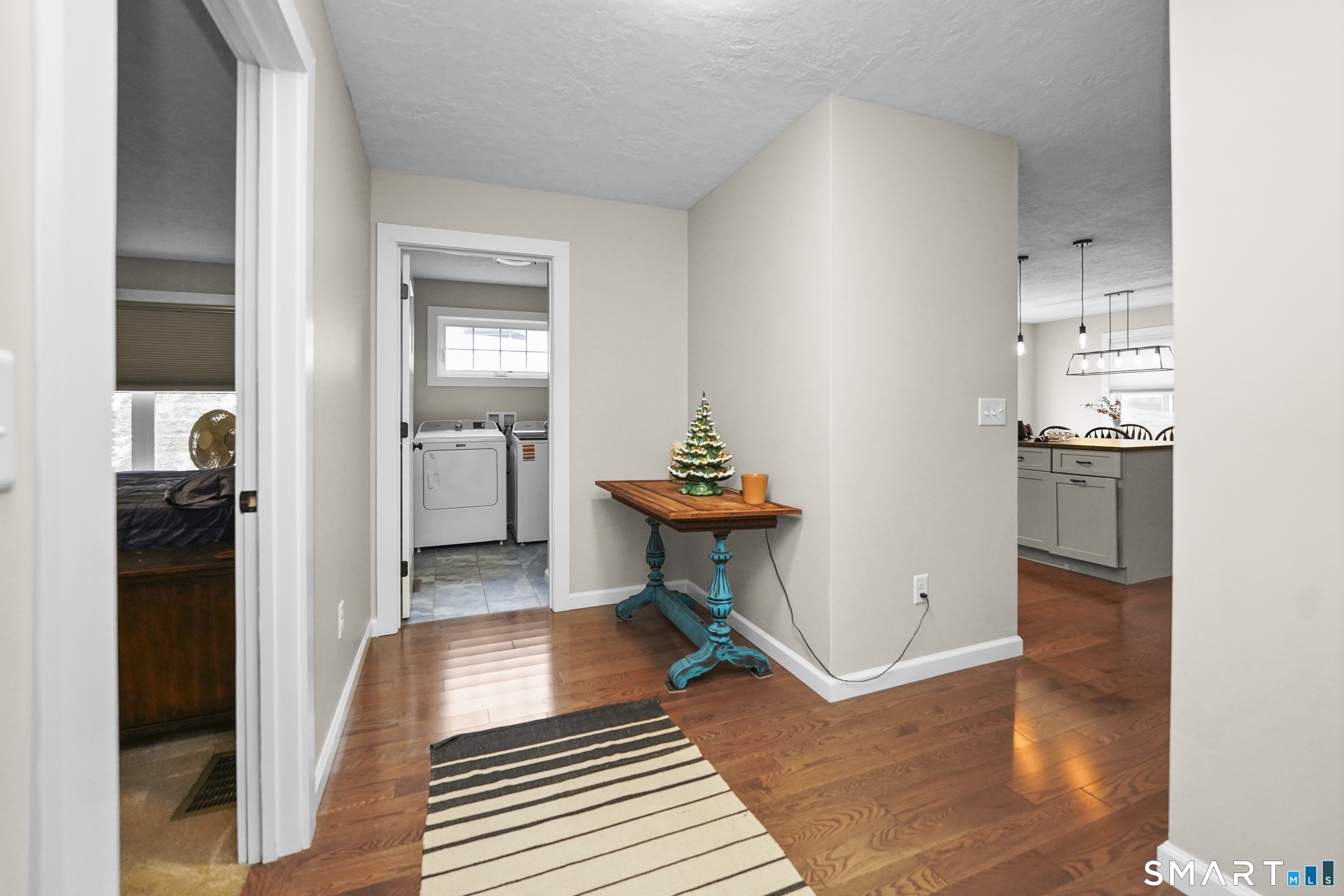 42 Chapman Chase, Unit 42 Windsor Locks, CT 06096 - Photo 15 of 38 a view of a kitchen from the hallway