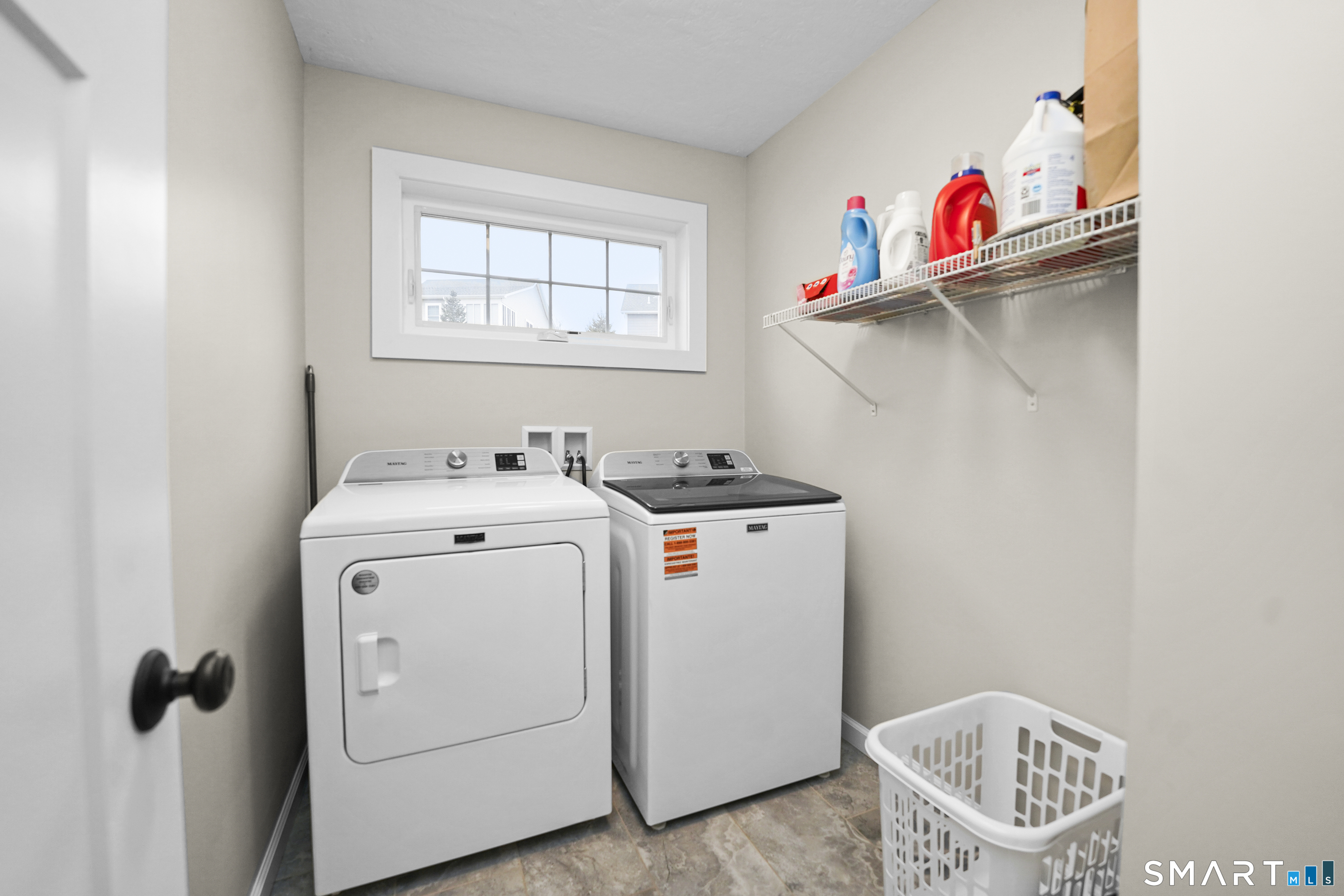 42 Chapman Chase, Unit 42 Windsor Locks, CT 06096 - Photo 17 of 38 a utility room with dryer and washer