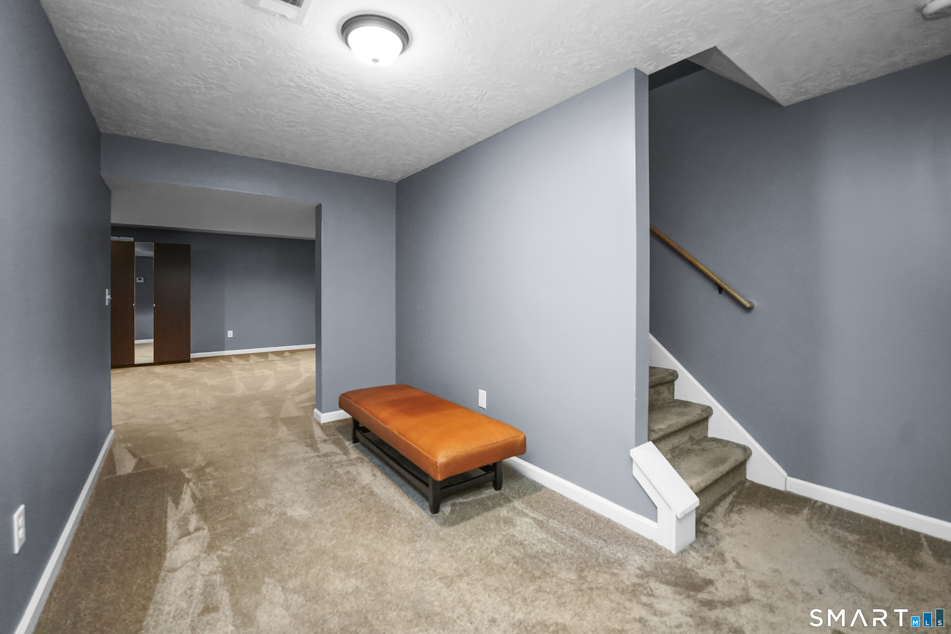 42 Chapman Chase, Unit 42 Windsor Locks, CT 06096 - Photo 31 of 38 an entryway and hall with a workspace