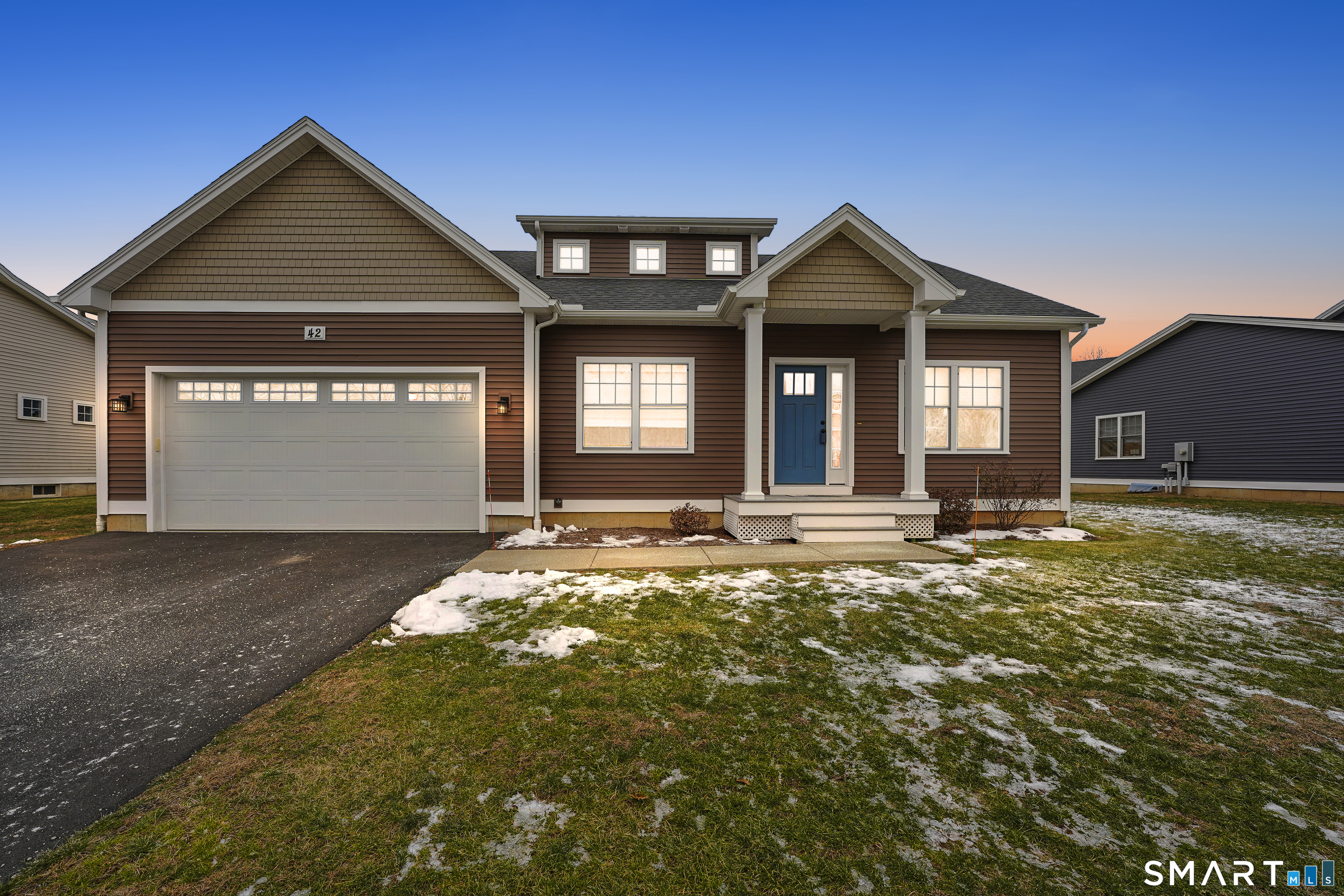 42 Chapman Chase, Unit 42 Windsor Locks, CT 06096 - Photo 38 of 38 a view of a house with a yard and garage
