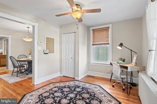 a bedroom with a bed and a table in it