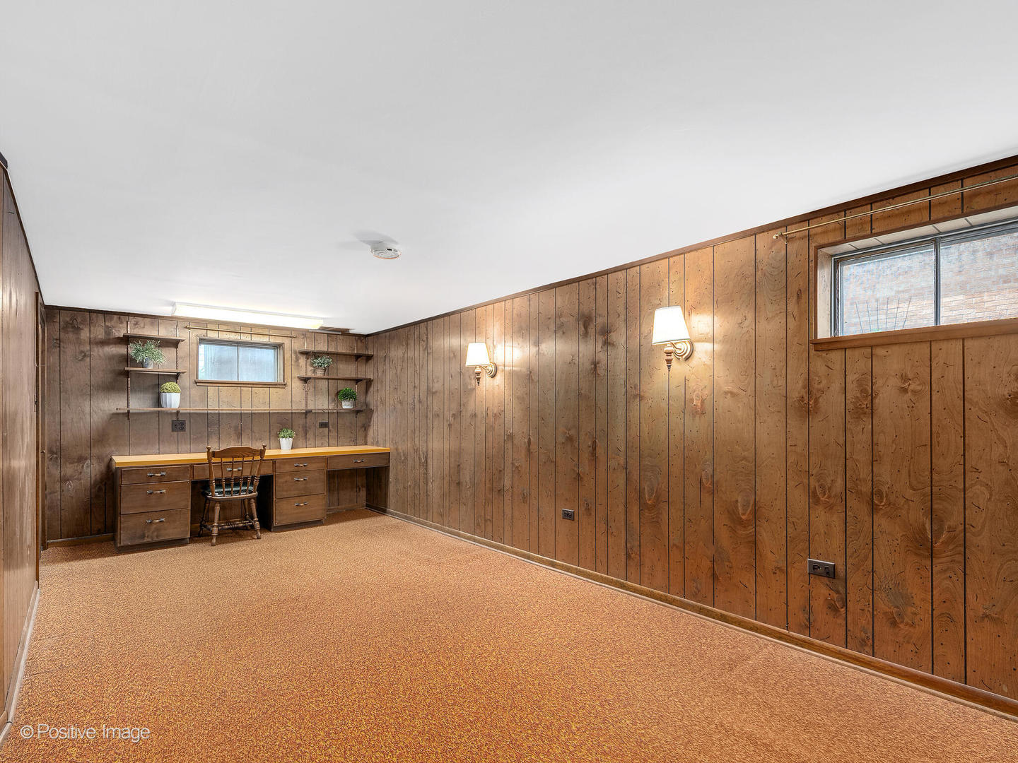 4220 Maple Avenue Brookfield, IL 60513 - Photo 16 of 22 a large room with furniture and a window