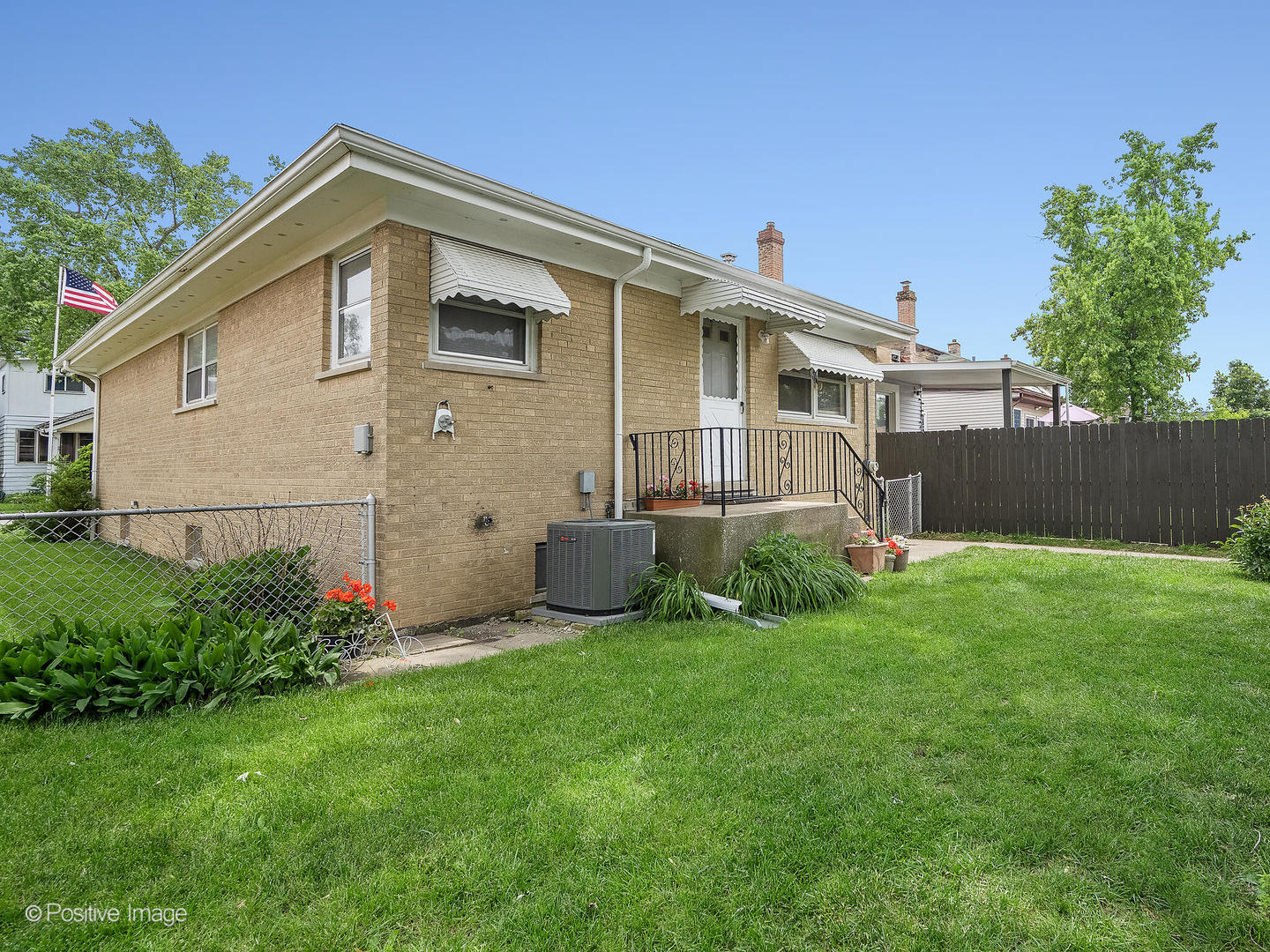 4220 Maple Avenue Brookfield, IL 60513 - Photo 19 of 22 a front view of house with yard and green space